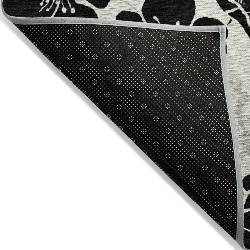 Tapis extérieur lavable floral ivoire et noir 9 pi x 12 pi