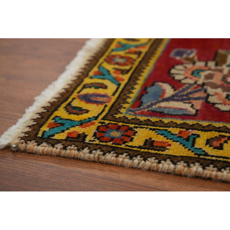 Tapis traditionnel rouge en laine à médaillon 3 x 5