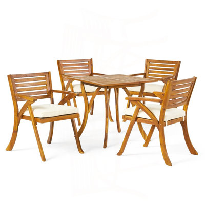 Ensemble repas d'extérieur en bois avec coussins 5 pièces Hermosa
