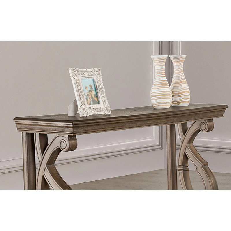 Table de canapé en bois massif de style traditionnel avec pieds sculptés et finition chêne vieilli, parfaite pour les salons élégants.