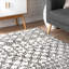 Tapis gris à motif géométrique Jeterson-343093922