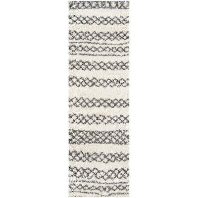 Tapis géométrique ivoire / noir Coss