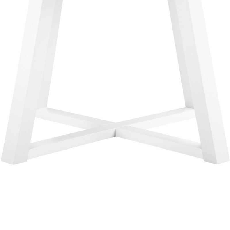 Table blanche contemporaine avec base à tréteaux pour un repas spacieux