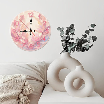 Horloge florale avec chiffres roses