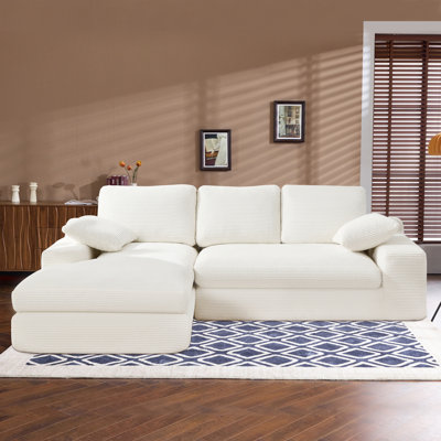 White Corduroy Compressed Sofa. It Has A Soft And Skin-Friendly Sitting Feel, Adding A Healing Atmosphere To The Warm Living Room. It Comes With 3 Back Cushions And 2 Throw Pillows.