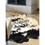Tapis en peau de vache naturelle Altonya