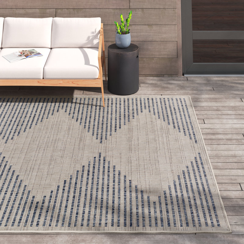 Calliah Striped Polypropylene Area Rug in Blue/Cream, Rectangle 5'3" x 7'