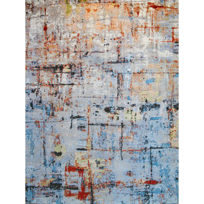 Tapis bleu / orange / ivoire de haute qualité noué à la main