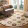 Emrick Hand Hooked Wool/Cotton/Latex Floral Rug in Ivory