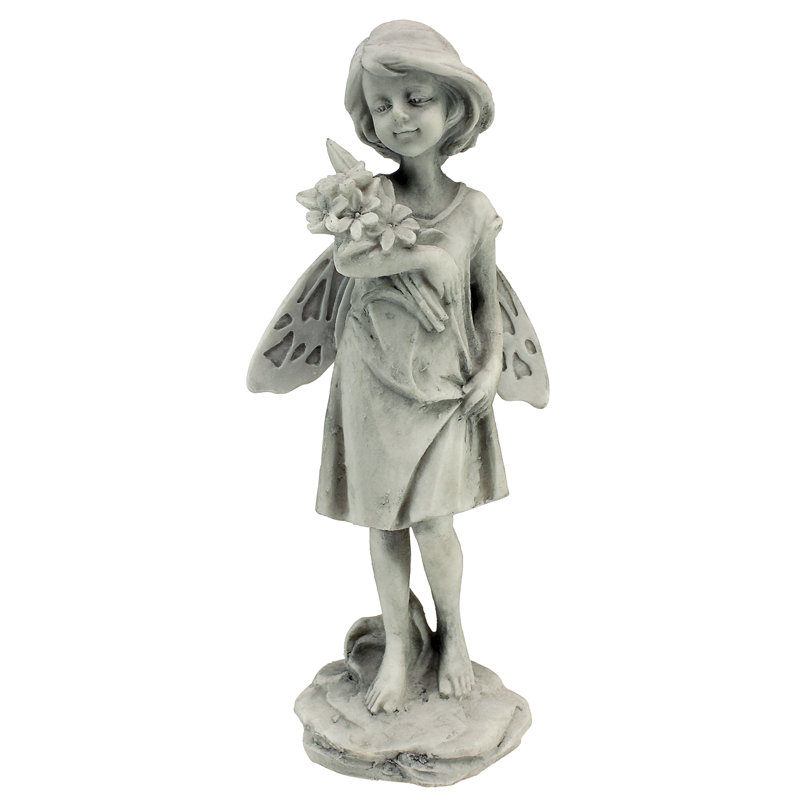 Statue de fées roses avec fleurs