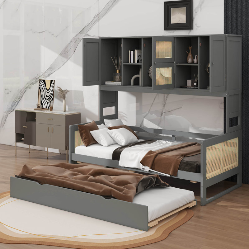 Lit de jour simple en bois peu encombrant, complet avec lit gigogne escamotable et compartiments de rangement modulaires