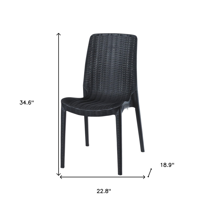 Ensemble de quatre chaises de salle à manger d'extérieur empilables en plastique noir