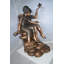 Statue deux enfants sur des rochers avec un oiseau en bronze - Taille: L 36 po x l 30 po x H 44 po.
