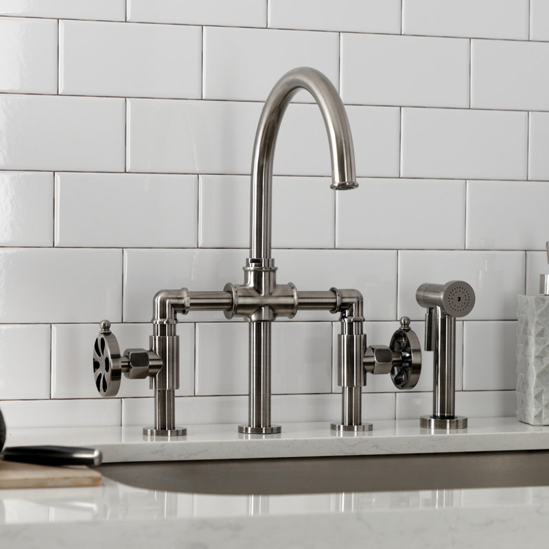 Kingston Brass Two-Handle 4-Hole Deck Mount Industrial Style Bridge Kitchen Faucet with Brass Side Sprayer, Black Stainless