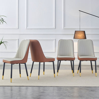 Une chaise de salle à manger moderne avec un dossier en cuir de polyuréthane bicolore brun clair et des pieds en métal noir, convenant aux cuisines, aux chambres et aux bureaux. Ensemble de 4 pièces (gris clair + brun + polyuréthane) C-007 W1151138283