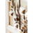 Metal Faux Wreath On Window Frame