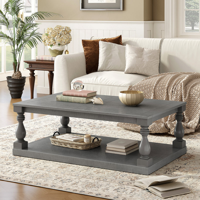 Table basse U_STYLE avec pieds en colonne de style artistique et placage de pin luxueux pour un charme intemporel, convenant au salon et à la salle d'étude