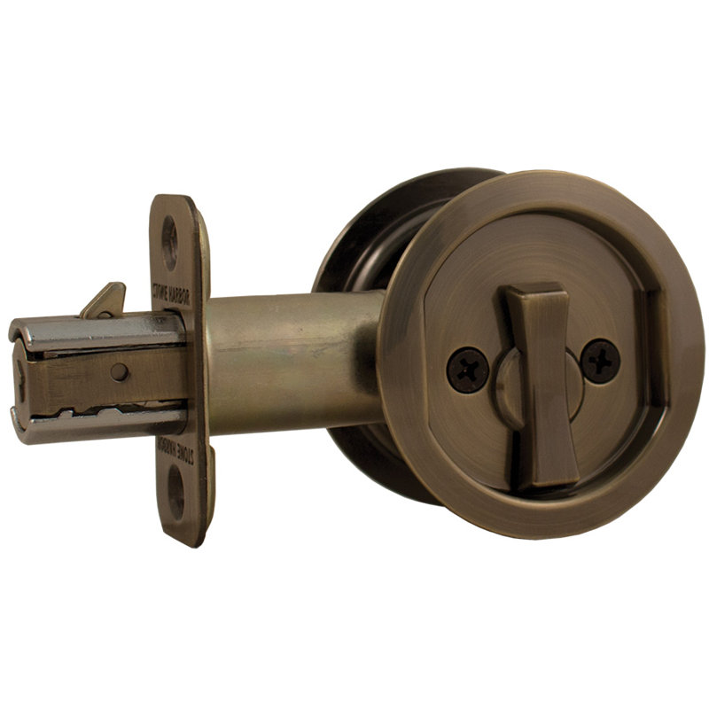 Serrure ronde pour porte escamotable, Laiton antique