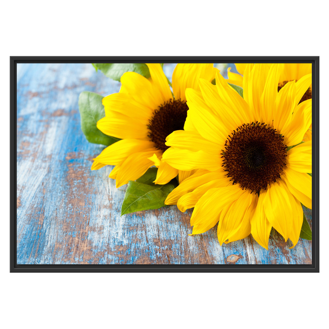 Leinwandbild Lovely Sunflowers auf Holztisch