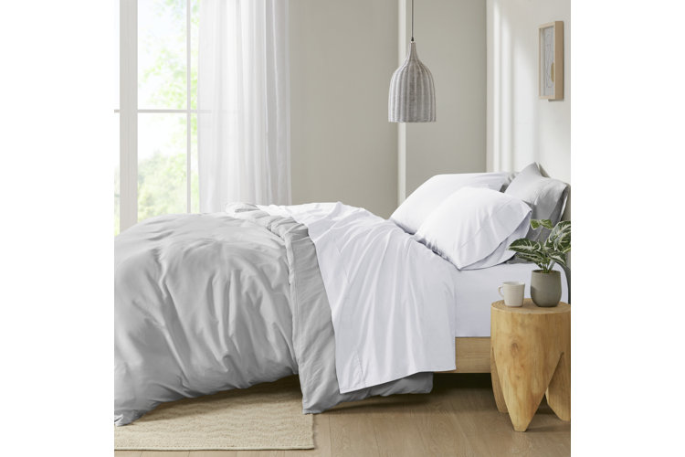 bed with white percale sheets
