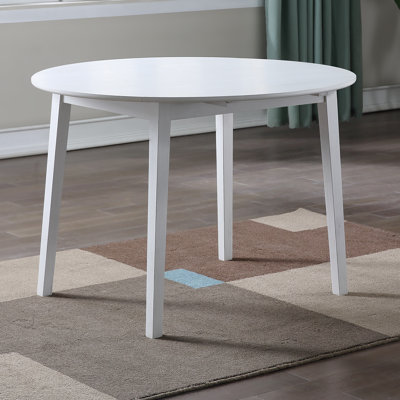 Ankit Extendable Round Solid Wood Base Dining Table