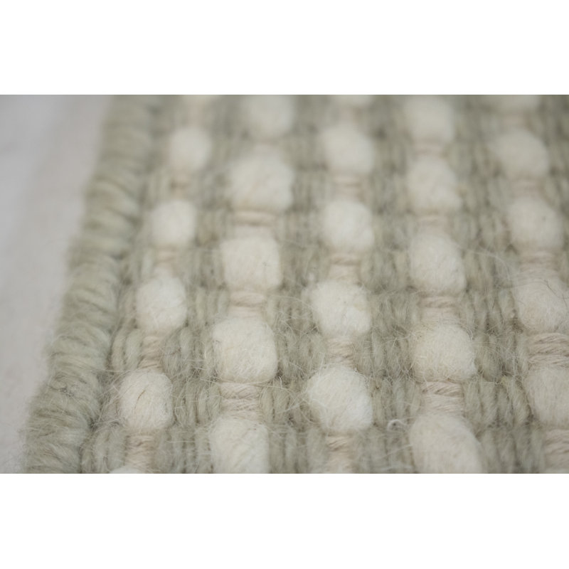 Tapis beige en laine tressé à la main Stengel