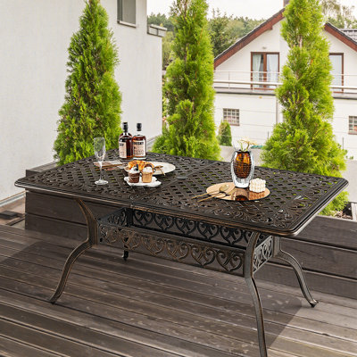 Table de salle à manger d'extérieur rectangulaire en fonte avec trou pour parasol 59 po Astoria Grand