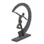 Figurine dansante avec croissant de lune