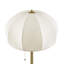 Lampe sur pied en céramique texturée avec abat-jour cannelé en tissu blanc