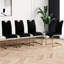 Chaise de salle à manger noire avec table ronde en verre et pieds dorés