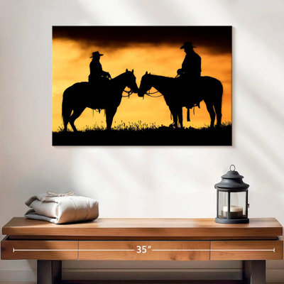 Lelar Cowboy And Cowgirl On Their Horses At Sunset