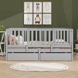 Wooden Daybed Featuring Fence-Style Guardrails And Two Built-In Drawers