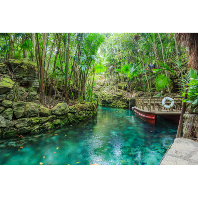 Blue River In Xcaret, Mexico by Vicnt - Wrapped Canvas Print