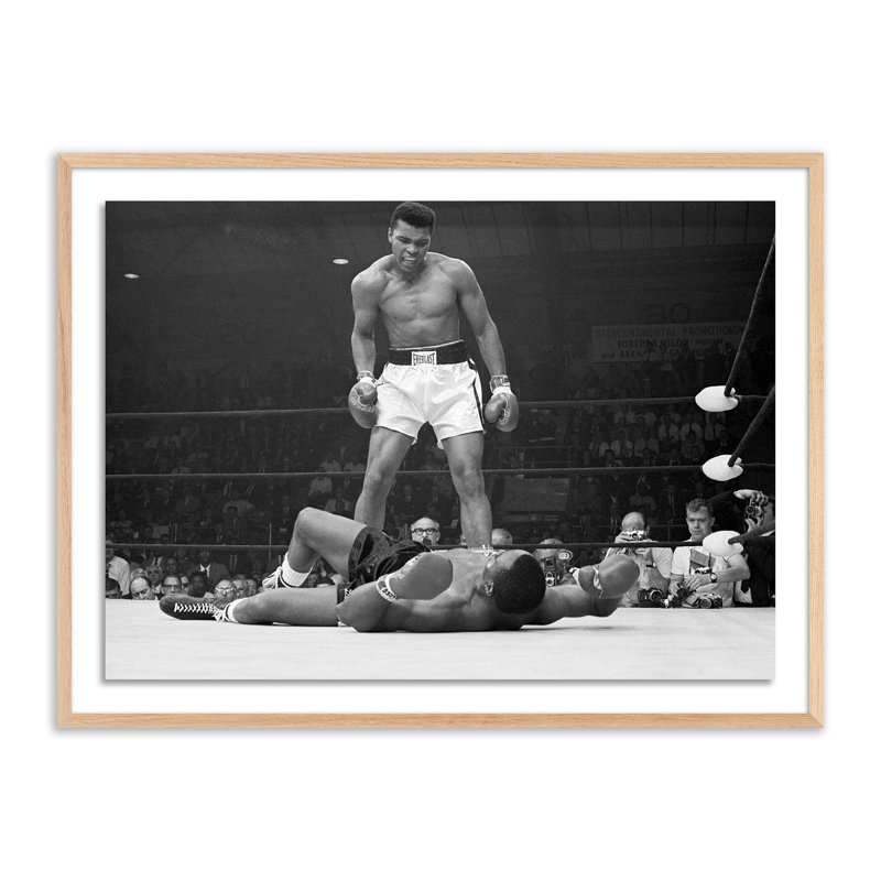 Muhammad Ali Taunting Sonny Liston Print by Getty Images, 18" H x 24" W, Black Maple Framed