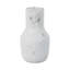 Vase sculpté en terre cuite fabriqué à la main avec finition texturée et accent noir.