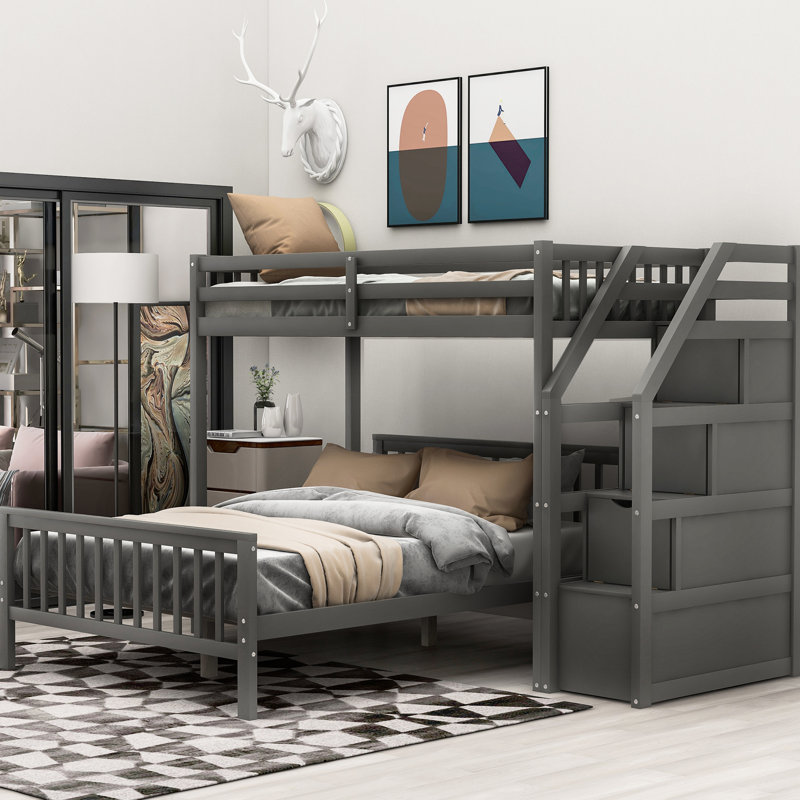 Lit simple superposé au-dessus d'un lit double gris, convenant à un lit mezzanine avec des solutions de rangement pratiques