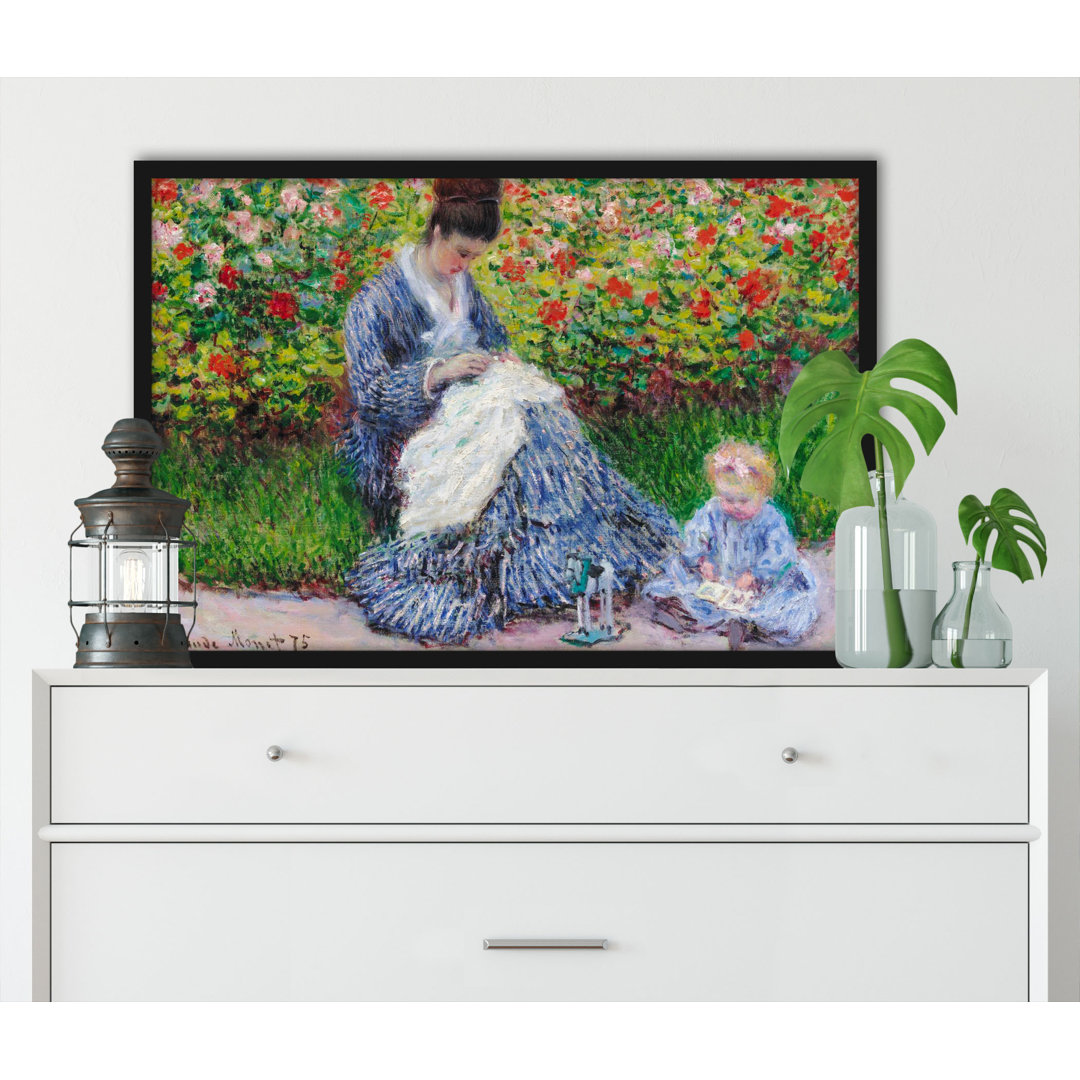 Gerahmtes Gemälde "Camille Monet and a Child in the Garden" von Claude Monet