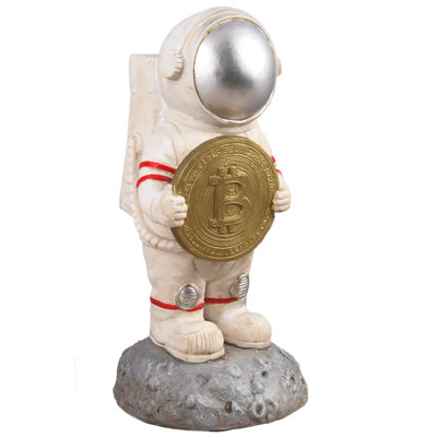 Statue astronaute debout sur la lune avec Crypto monnaie Bitcoin