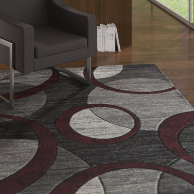 Tapis noir à motif abstrait Adonia