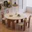Table de salle à manger extensible ovale en pierre frittée de 150 cm (59 po), transformable en table ronde, pouvant accueillir de 4 à 10 personnes.