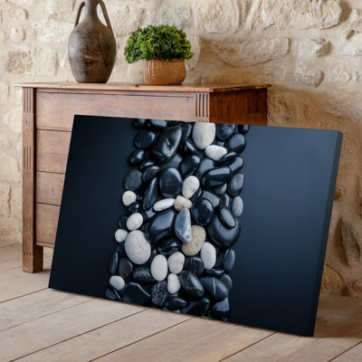 Canvas A Close Up Vertical Arrangement Of Smooth Rounded Pebbles In Wall Art A Harmonious Blend Of Black White And Gray Tones Canvas Wall Art
