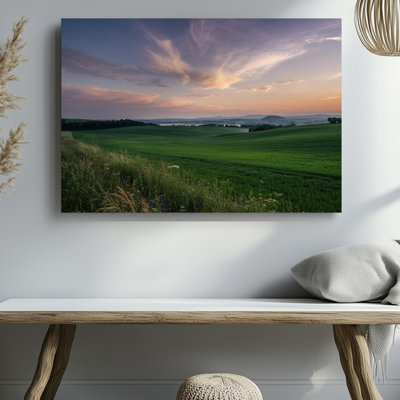 Canvas A Serene Landscape At Dusk Featuring Expansive Green Fields That Wall Art Stretch Towards Distant Rolling Hills The Sky Is A Canvas Wall Art