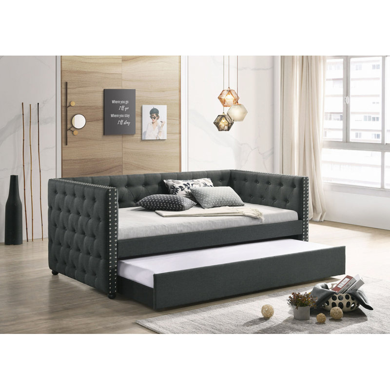 Lit de jour en tissu gris avec couchette