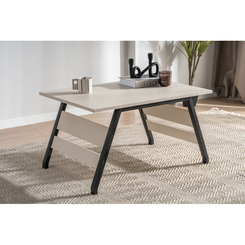 Table basse ovale avec rangement caché en noir mat