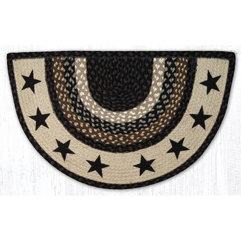 Tapis noir à motif d'étoiles noires