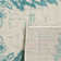 Annette Damask Ivory/Teal Area Rug