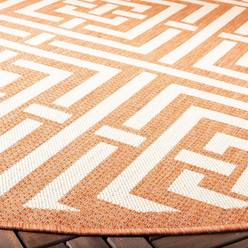 Tapis d'intérieur / extérieur à motif géométrique terre cuite / crème Arneshia, Rond 5 pi 3 po