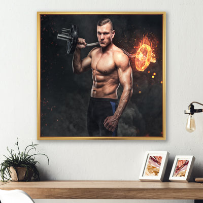 " Muscular Athletic Male Holds Burning Barbell "
