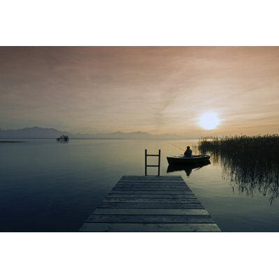 Fisher in Boat at Dusk by Dietermeyrl