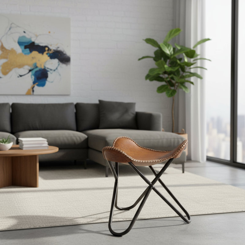 Tabouret en cuir trépied
